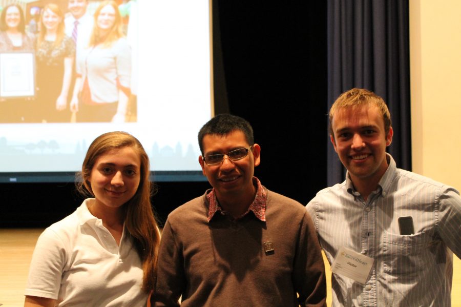 Senior Carolyn Schnackenburg joined Fair Trade representative, Parker Townley, and Guatemalan Fair Trade coffee farmer, Miguel Mateo after their presentation about the effects of Fair Trade on workers' wages worldwide.
Catherine Considine '13