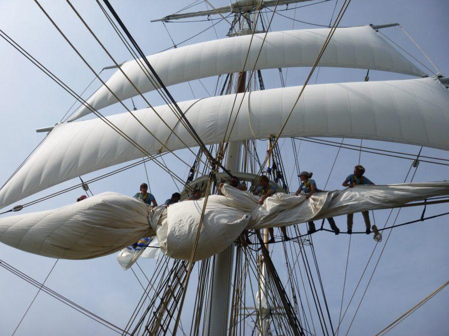 Members+of+the+Charles+W.+Morgan+crew+furling+a+sail.%0ACourtesy+of+Dr.+Cristina+Baptista+