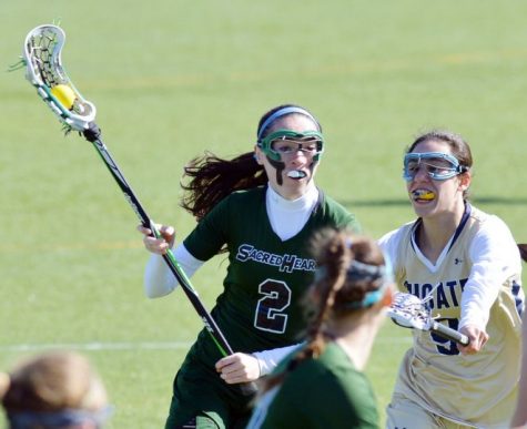 Colleen defends her home turf in a lacrosse game against Choate.
Courtesy of ctpost.com 