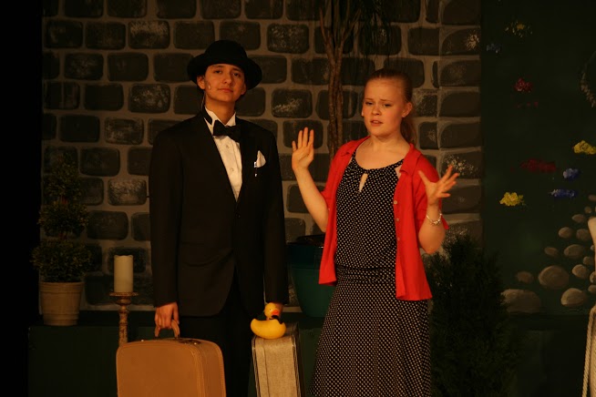 Seniors Nebai Hernandez-Carmona and Lydia Currie perform a scene from Jeeves in Bloom.
Courtesy of Miss Danielle Gennaro 05