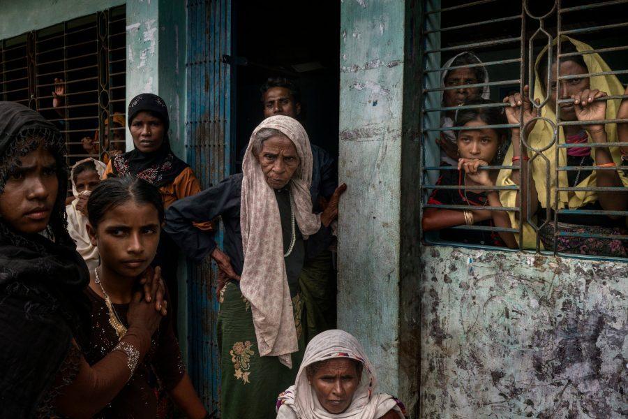 Rohingya people waiting at government building to be assigned to a settlement. Photo courtesy of https://www.nytimes.com/2017/09/18/world/asia/myanmar-rohingya-ethnic-cleansing.html?_r=0