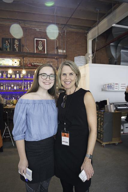 Mary Himes and daughter Linley Himes pose for a picture at #UNLOADS first art exhibit. Photo Courtesy of the Greenwich Free Press (Asher Almonacy).