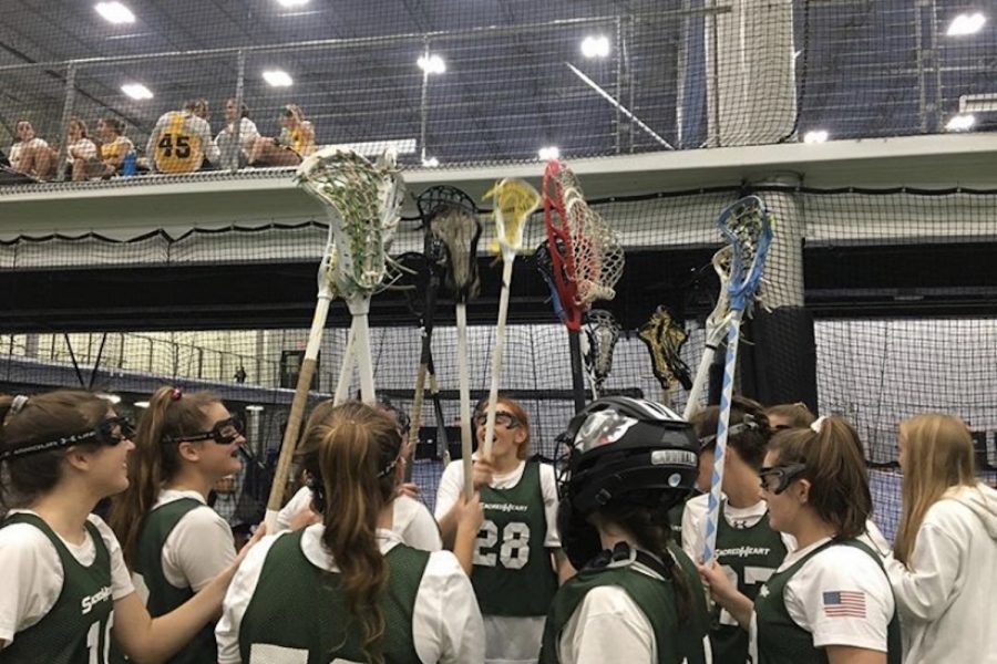 The+2019+varsity+lacrosse+team+at+the+Inside+Lacrosse+Indoor+National+Championship.+
